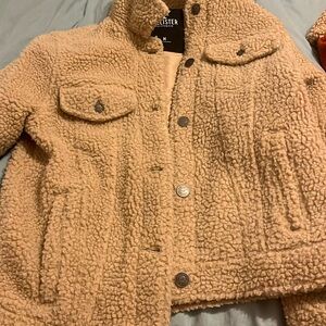 Brown fuzzy button up bomber jacket